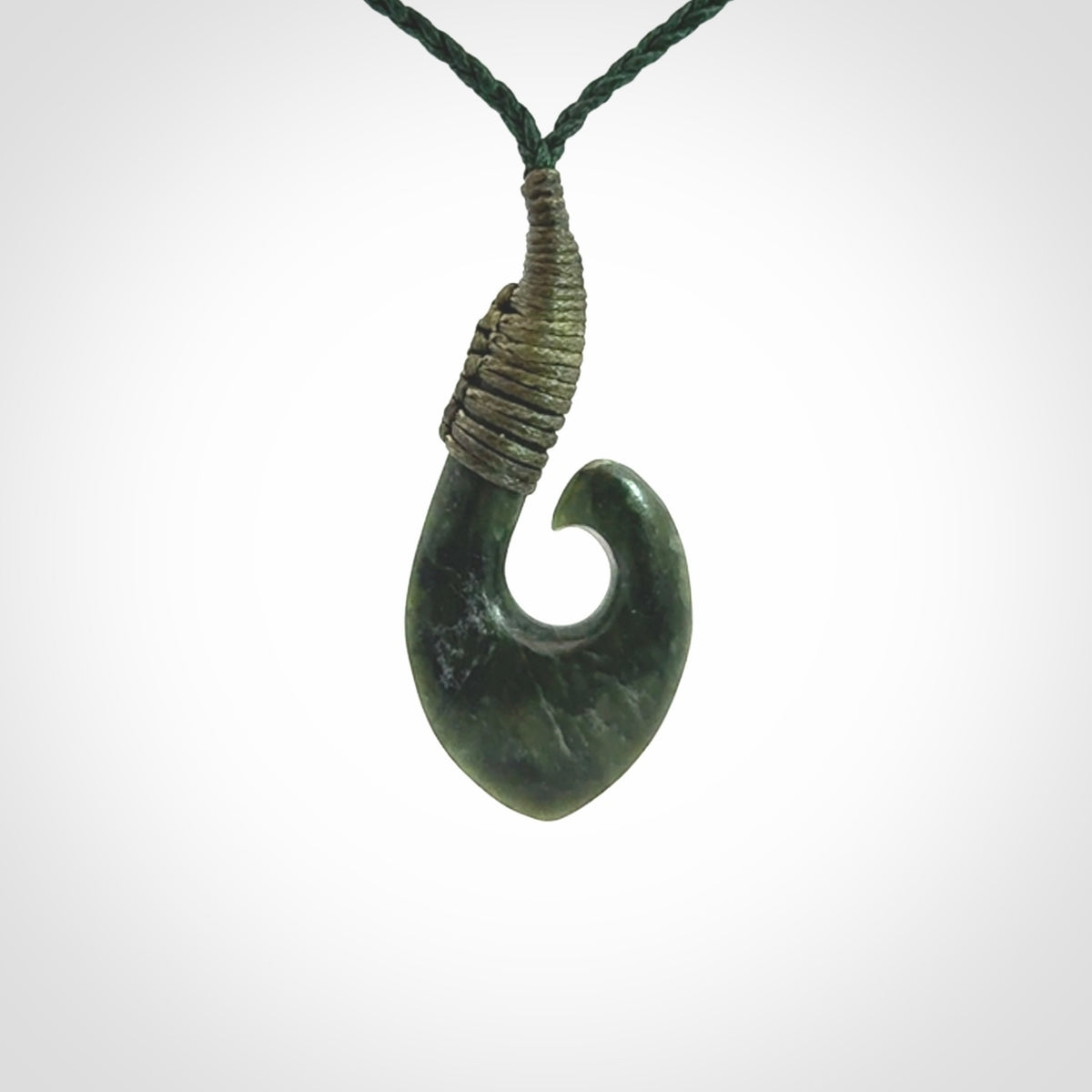 Hand carved New Zealand Jade hook pendant