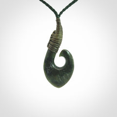 Hand carved New Zealand Jade hook pendant