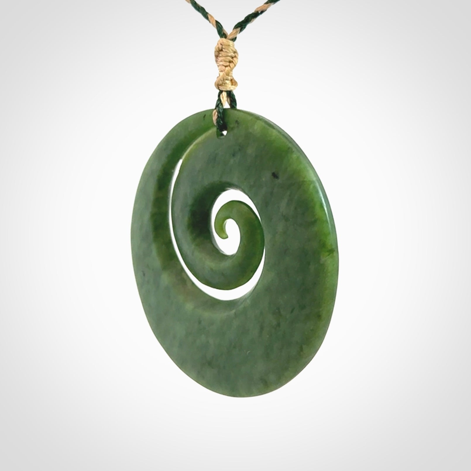 A Full-Bodied, Stand Out, Koru Pendant in Jade