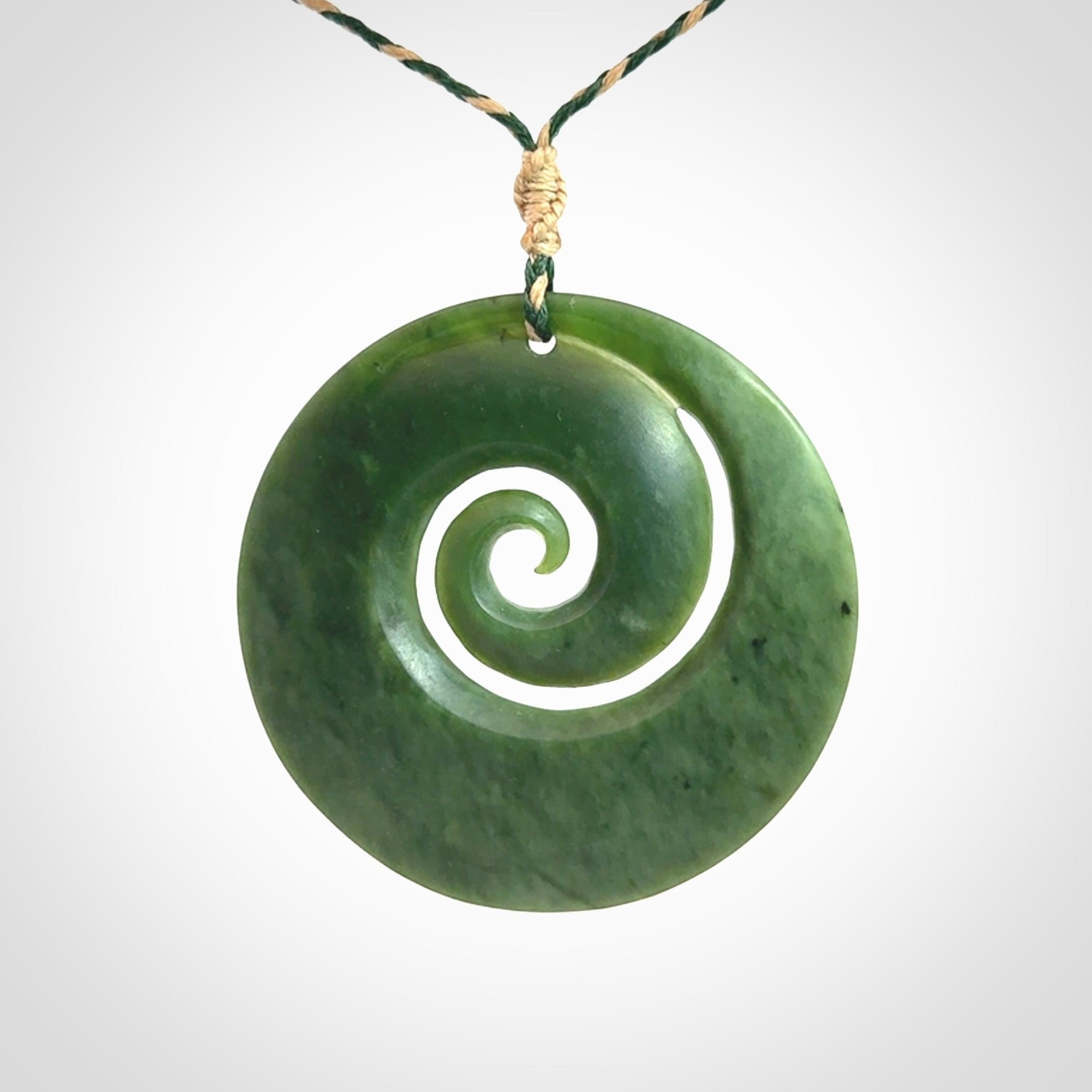 A Full-Bodied, Stand Out, Koru Pendant in Jade