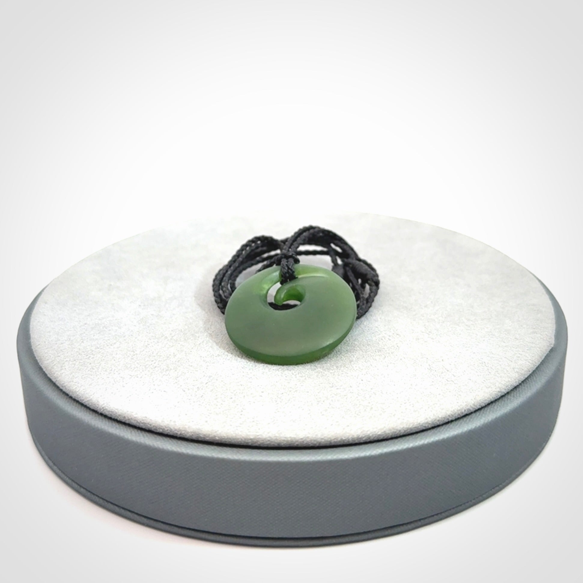 Hand carved New Zealand Jade koru pendant