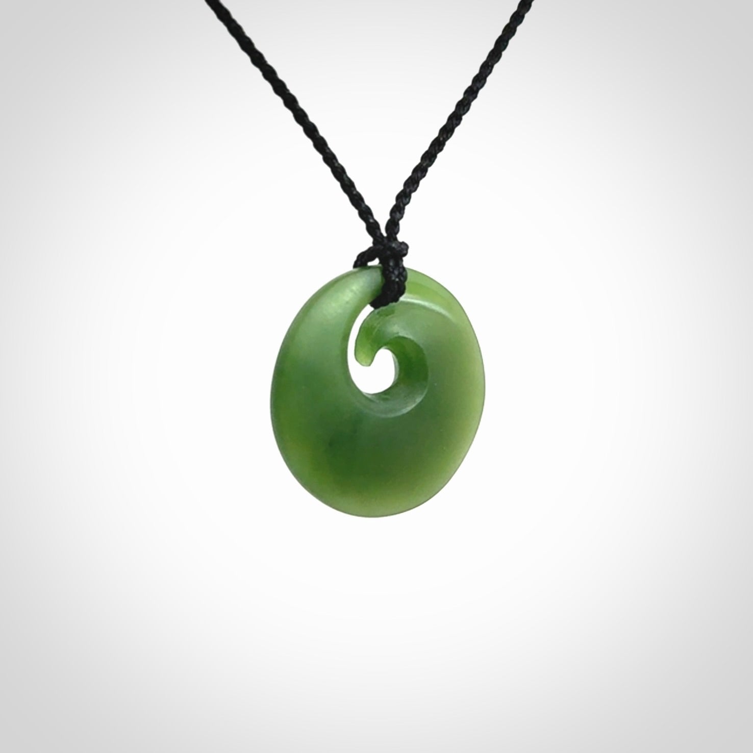 Hand carved New Zealand Jade koru pendant