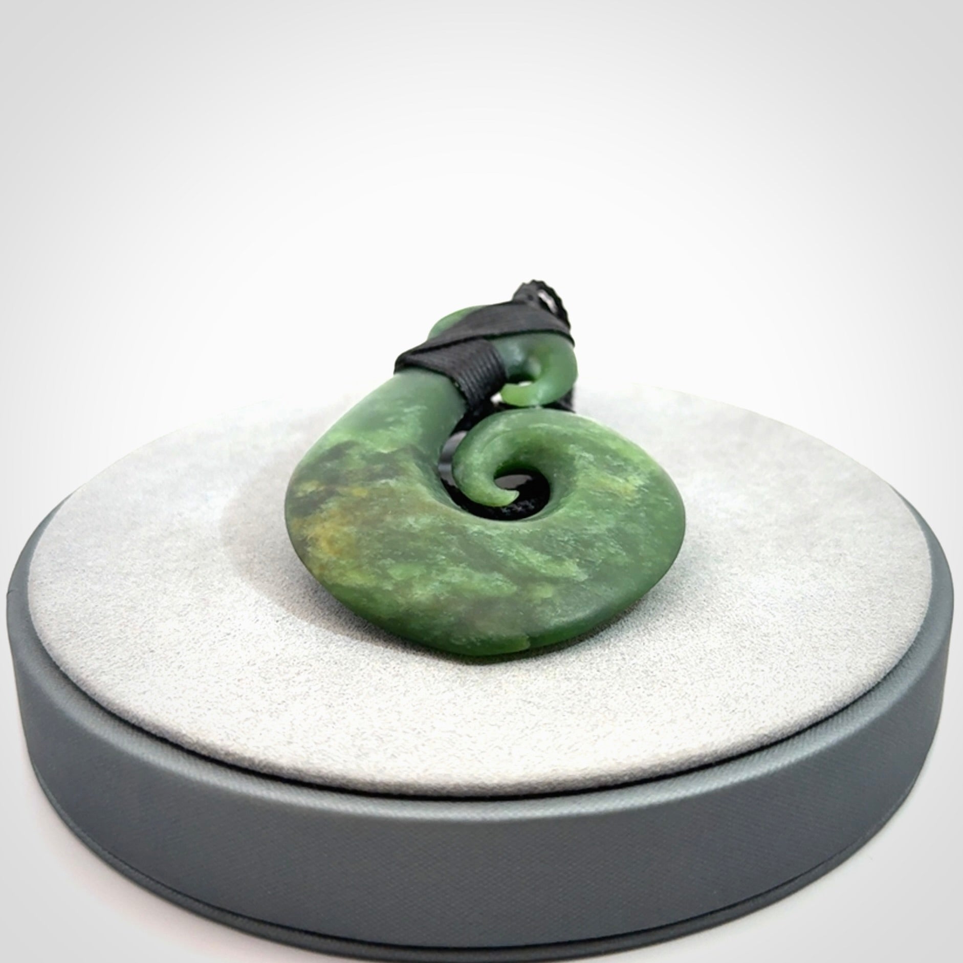 Hand carved New Zealand Jade koru pendant