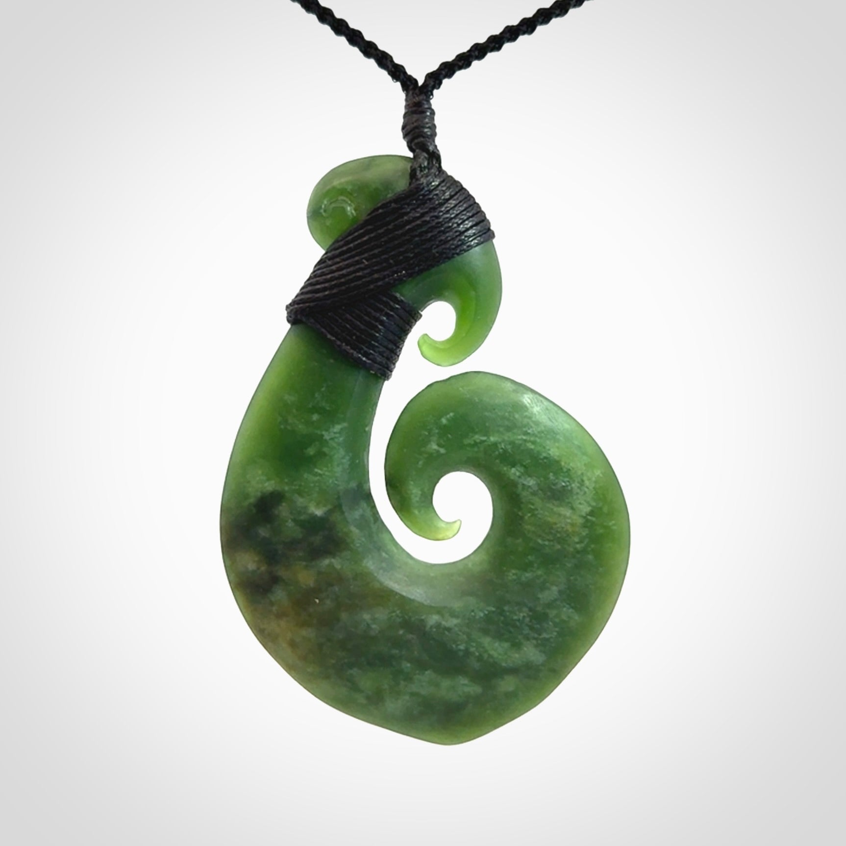 Hand carved New Zealand Jade koru pendant