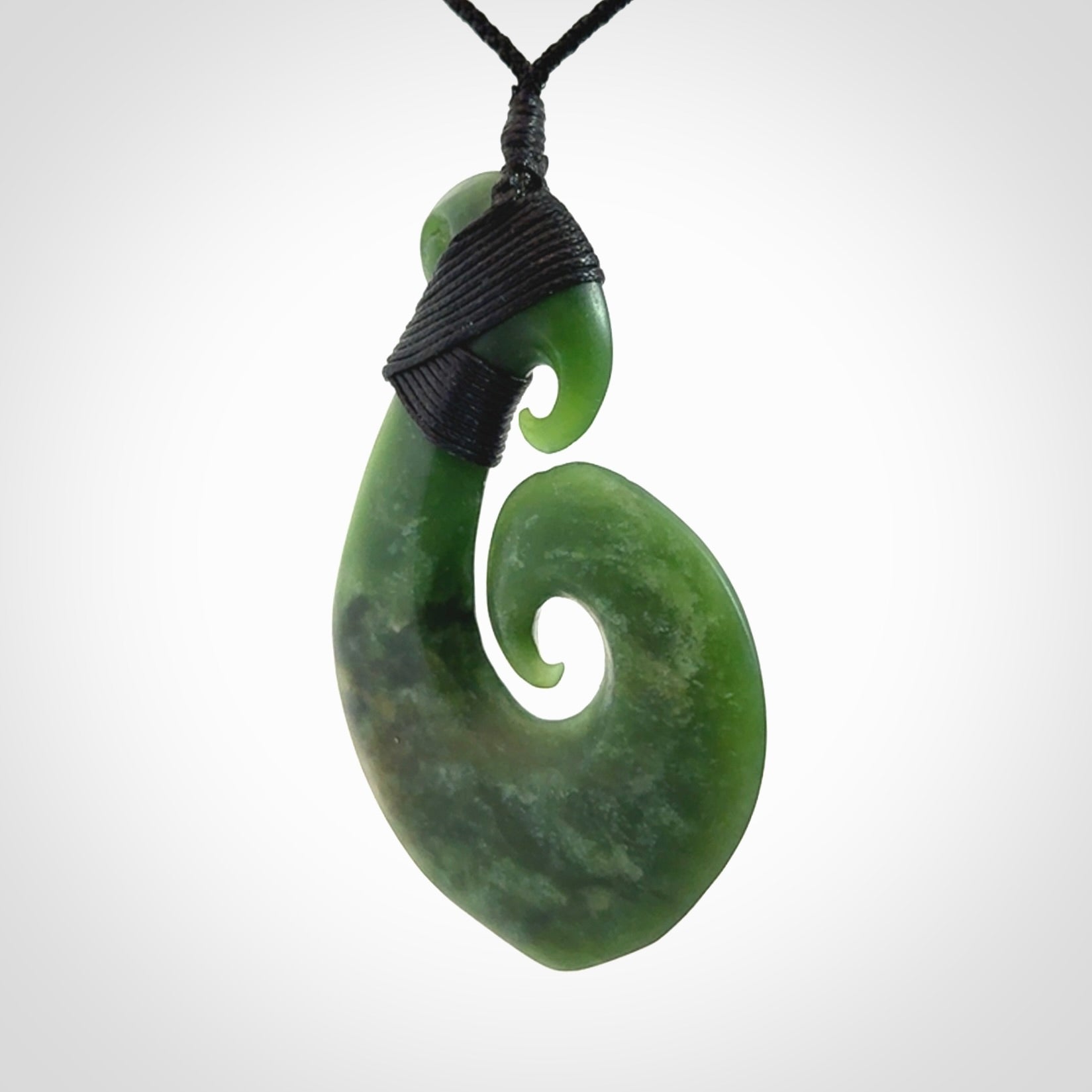 Hand carved New Zealand Jade koru pendant