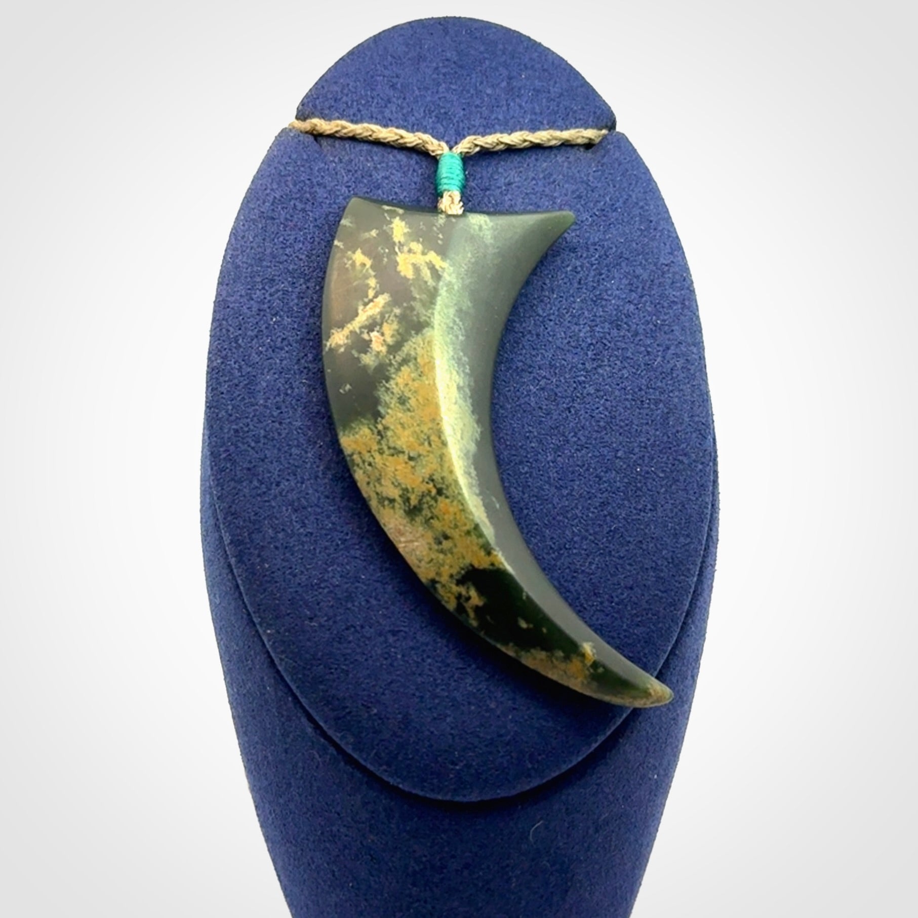 Hand Carved Niho Pendant in New Zealand Marsden Jade