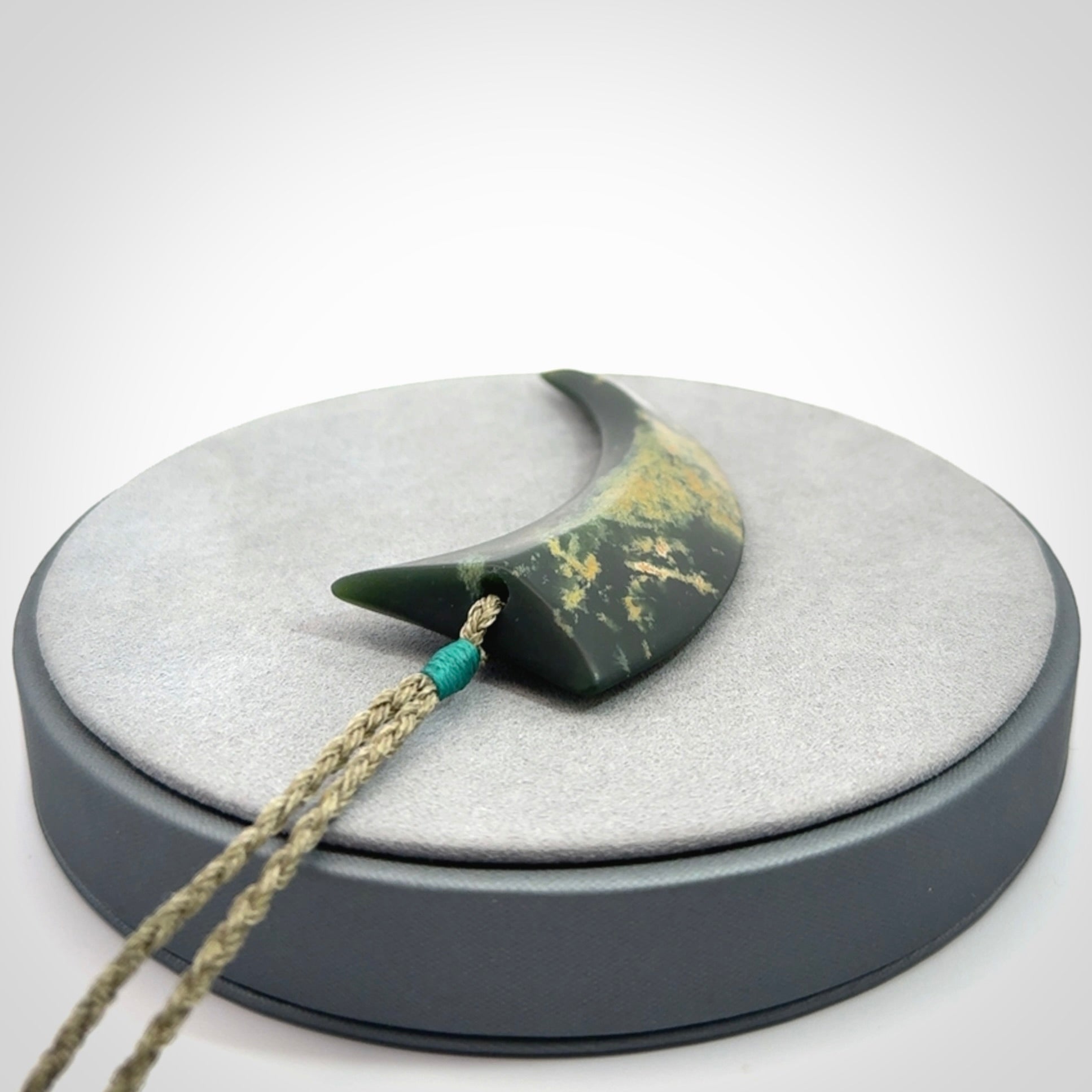 Hand Carved Niho Pendant in New Zealand Marsden Jade