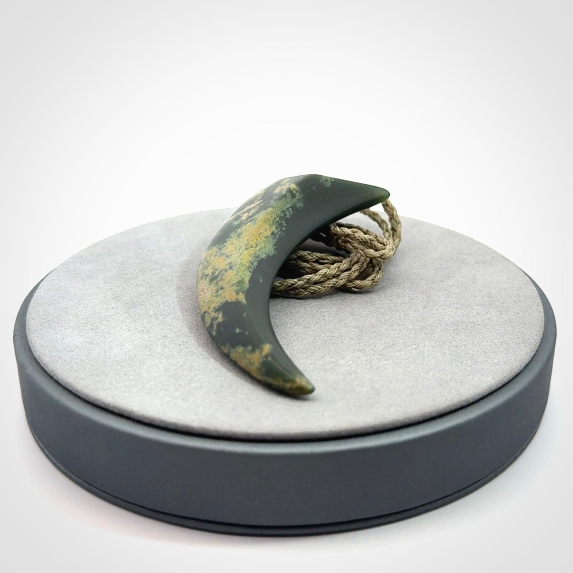 Hand Carved Niho Pendant in New Zealand Marsden Jade