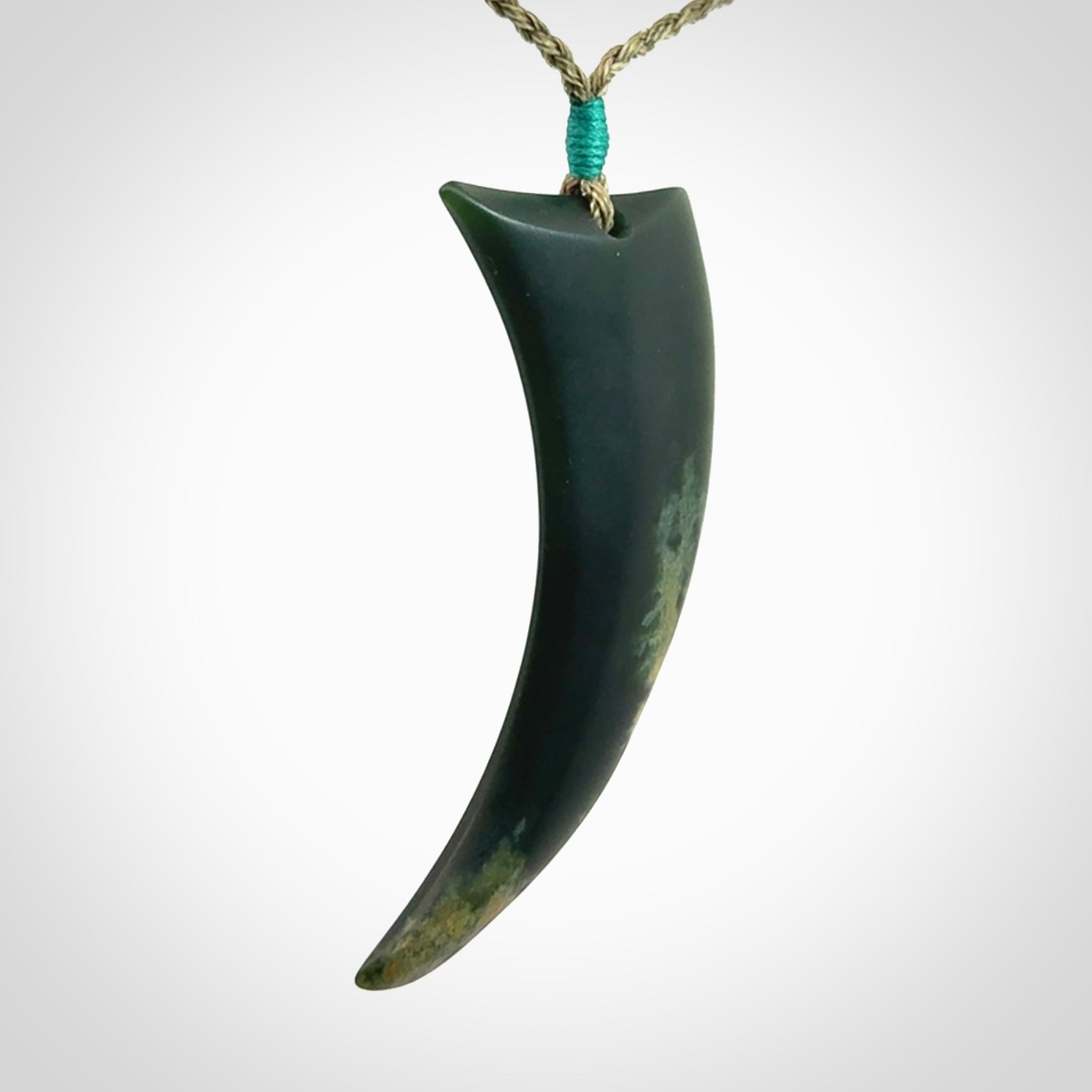 Hand Carved Niho Pendant in New Zealand Marsden Jade