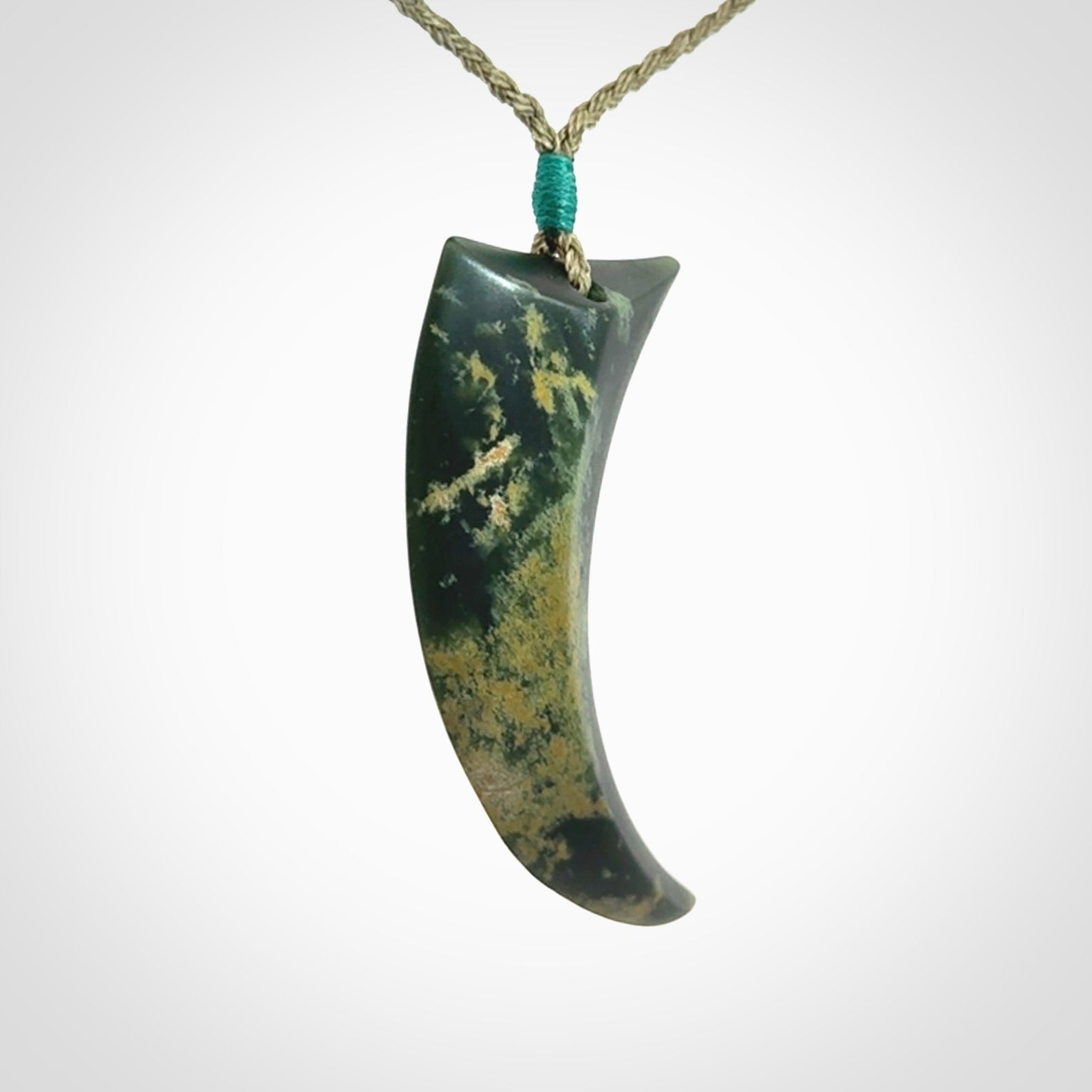 Hand Carved Niho Pendant in New Zealand Marsden Jade