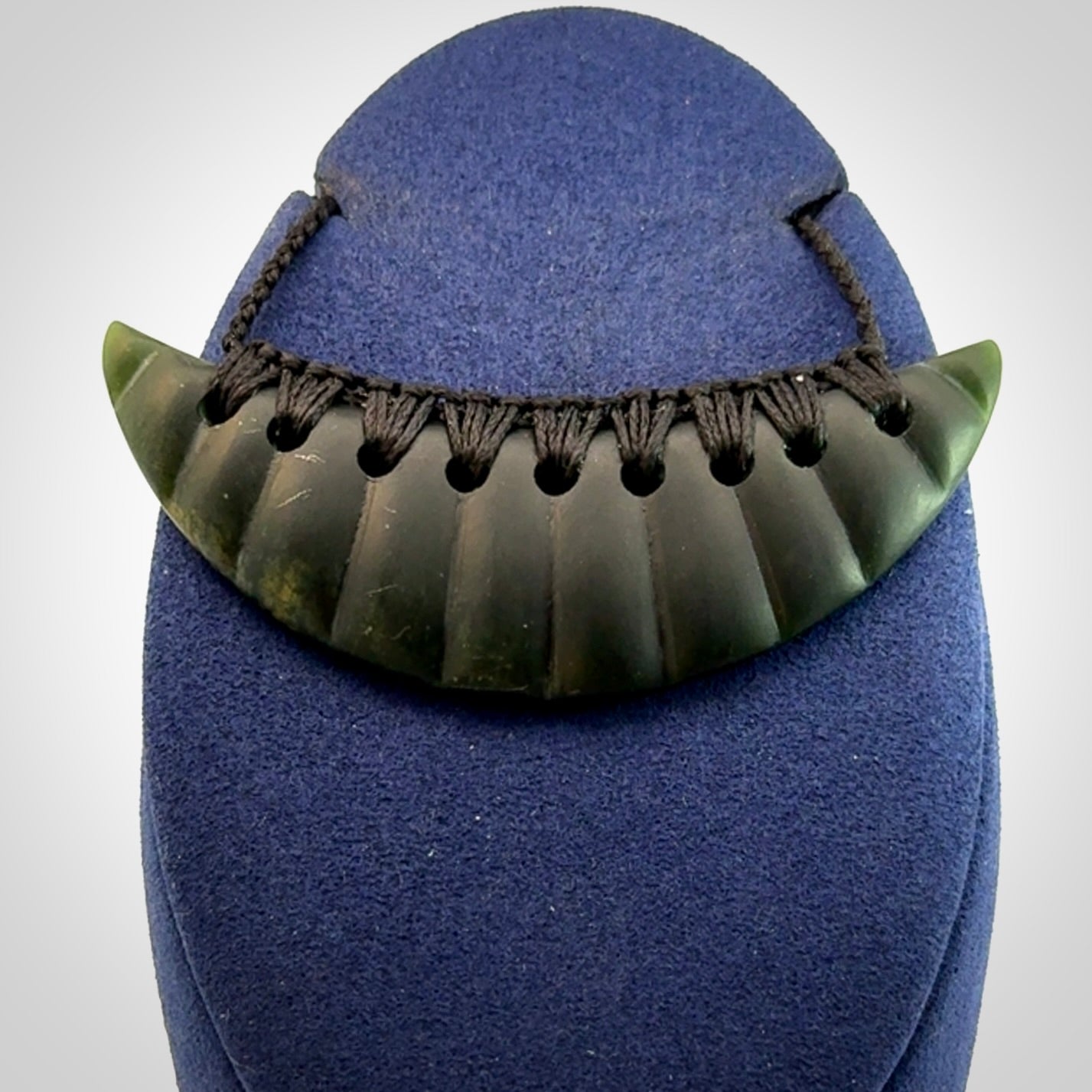 Hand carved New Zealand Jade shield pendant