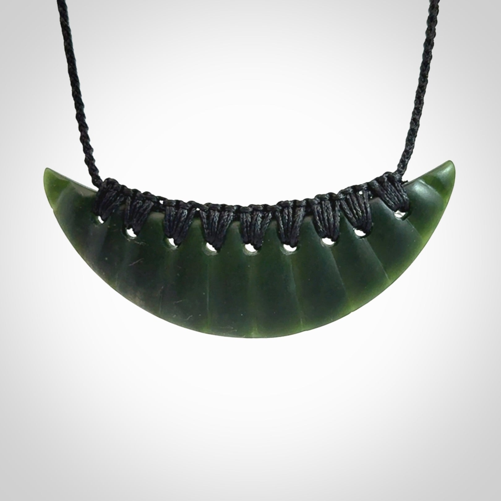Hand carved New Zealand Jade shield pendant