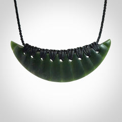 Hand carved New Zealand Jade shield pendant