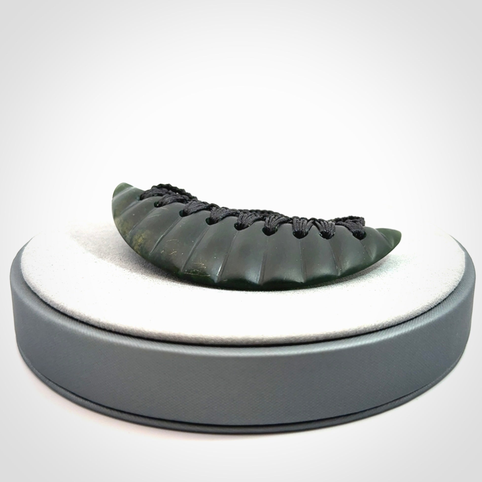 Hand carved New Zealand Jade shield pendant