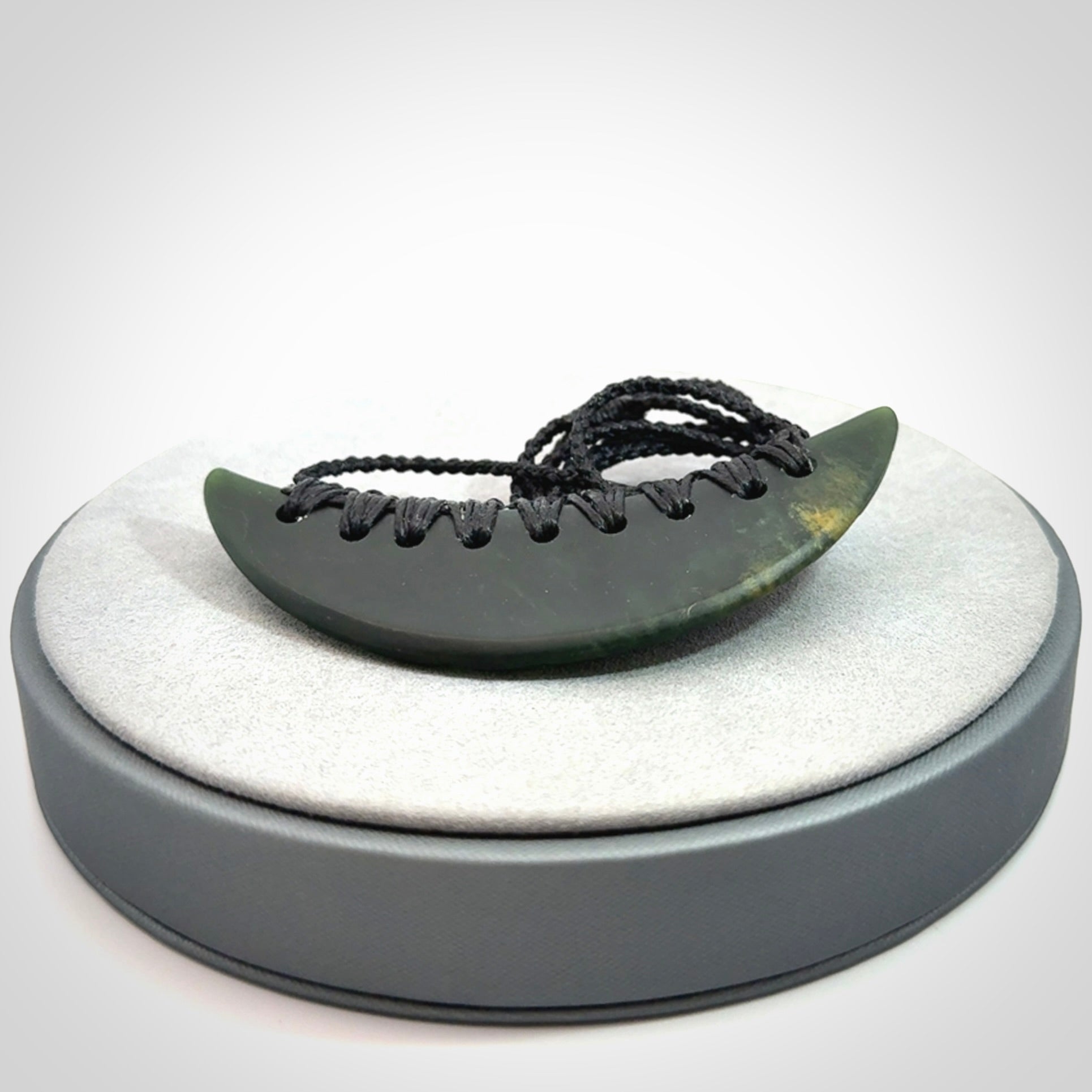 Hand carved New Zealand Jade shield pendant
