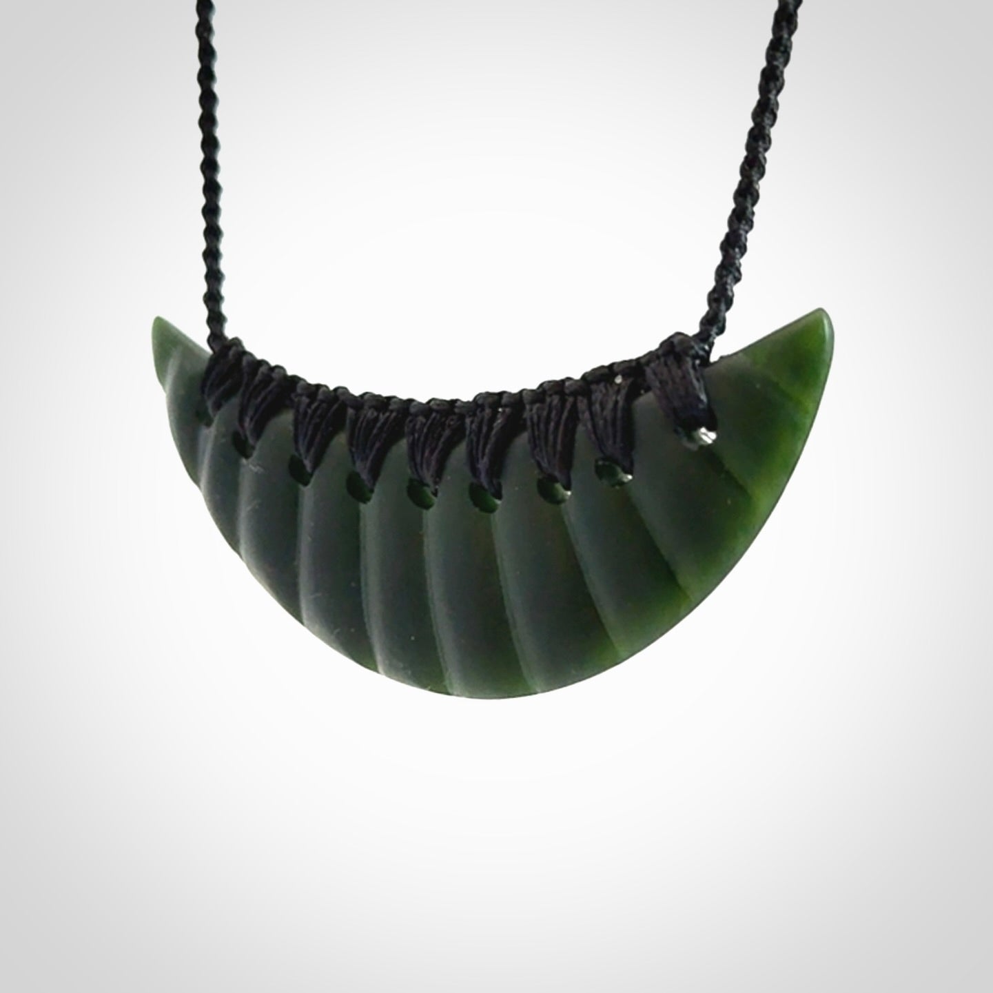 Hand carved New Zealand Jade shield pendant