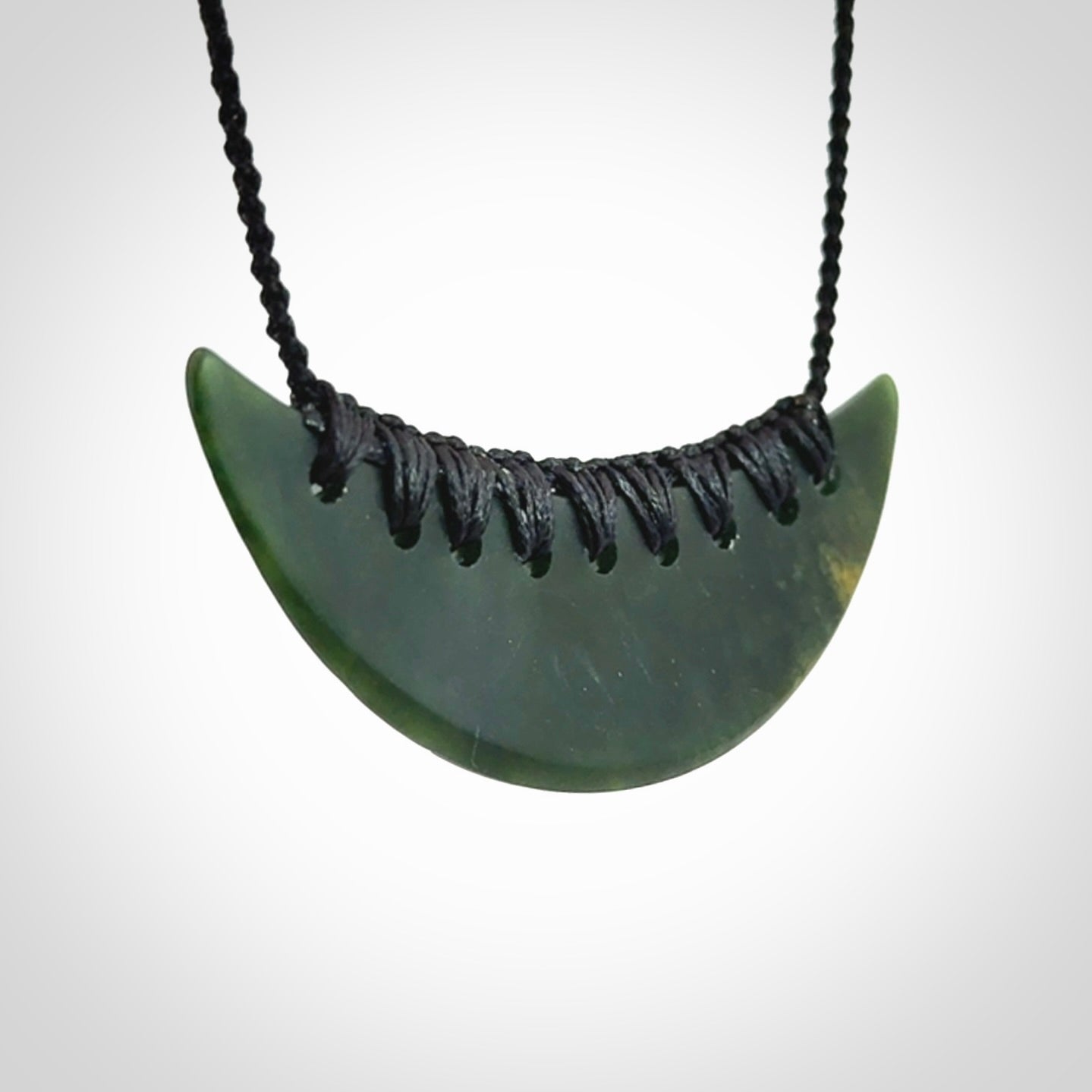 Hand carved New Zealand Jade shield pendant