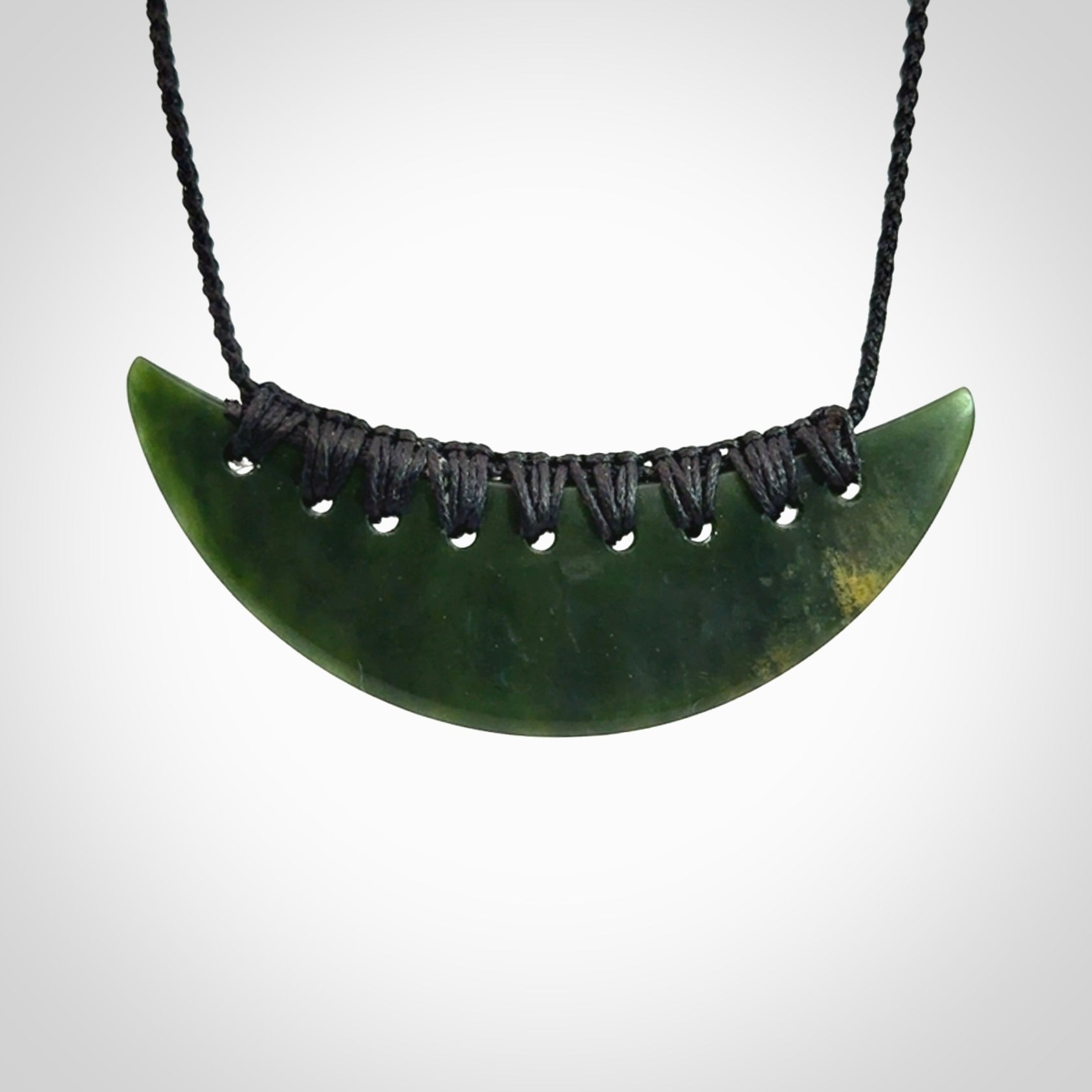 Hand carved New Zealand Jade shield pendant