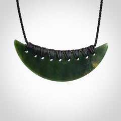 Hand carved New Zealand Jade shield pendant
