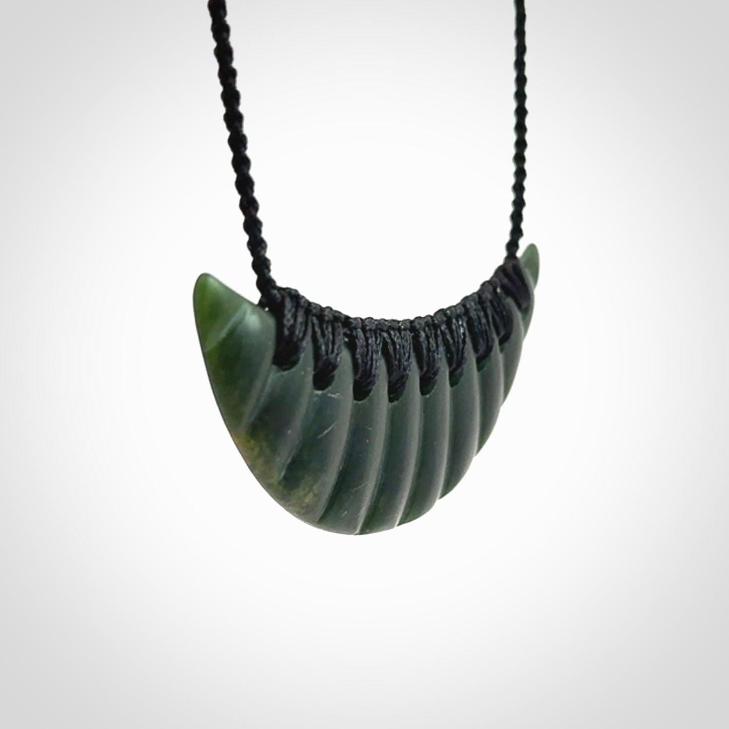 Hand carved New Zealand Jade shield pendant