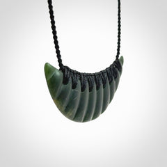 Hand carved New Zealand Jade shield pendant