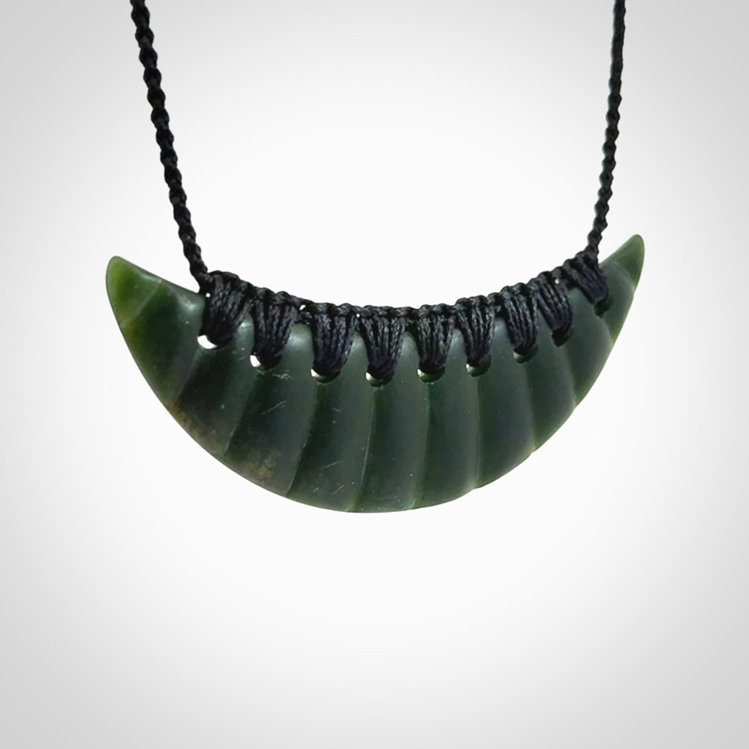 Hand carved New Zealand Jade shield pendant