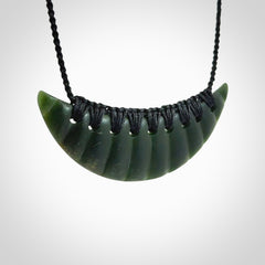 Hand carved New Zealand Jade shield pendant