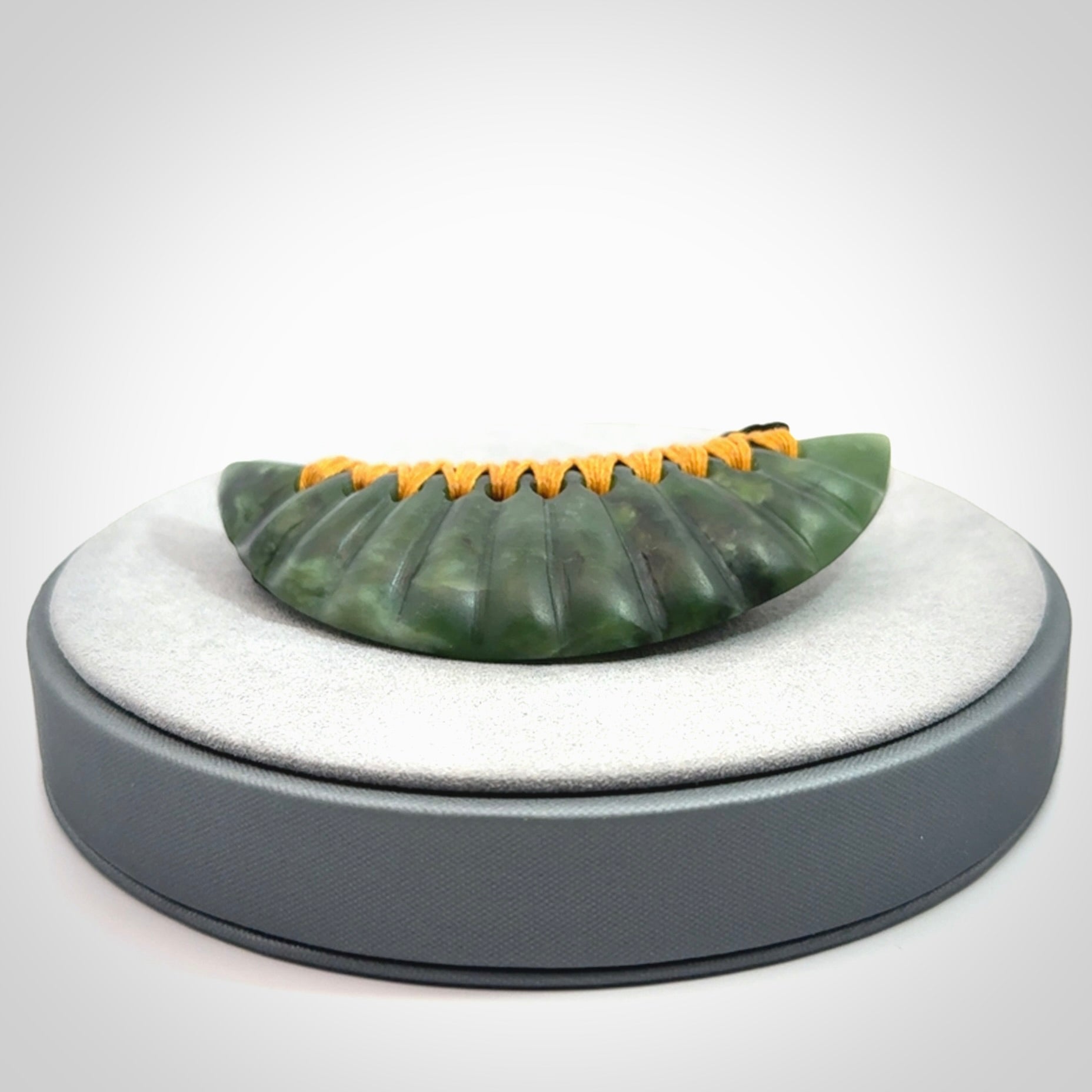 A Gorgeous New Zealand Jade Half-Shield Pendant
