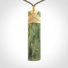 A Beautiful Slender Toki Pendant