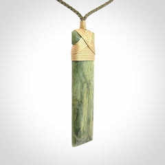 A Beautiful Slender Toki Pendant