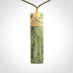 A Beautiful Slender Toki Pendant
