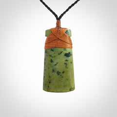 A Striking and Edgy Jade Toki Pendant