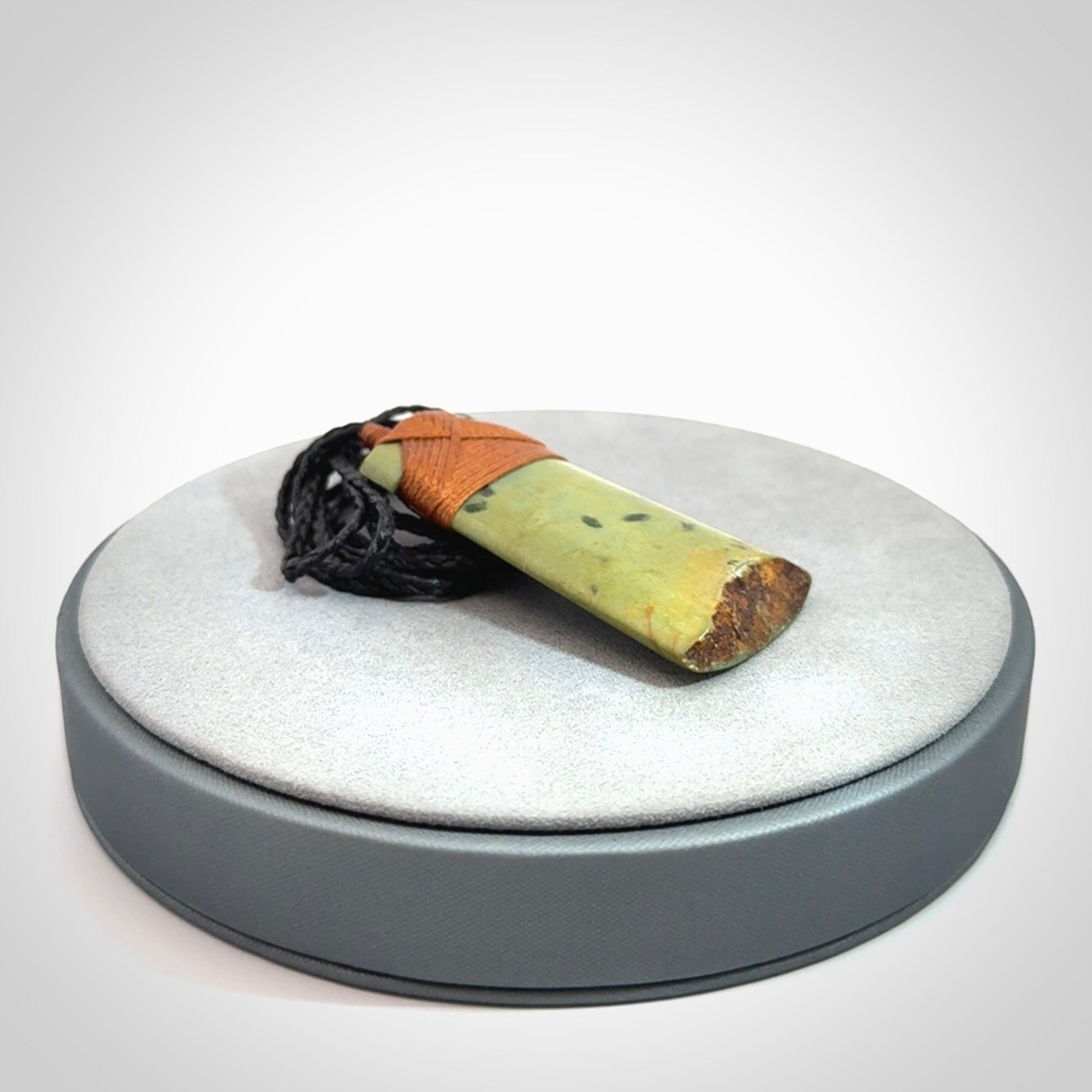 A Striking and Edgy Jade Toki Pendant