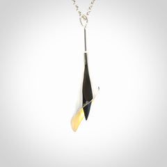 Sterling Silver drop pendant with Black Jade centre and Gold Plated interior. Provided with a sterling silver chain.