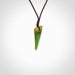Hand carved medium sized pounamu drop pendant. Jade necklace hand made in New Zealand. A contemporary drop pendant carved from rare New Zealand jade. NZ Pacific jade jewellery for sale online.