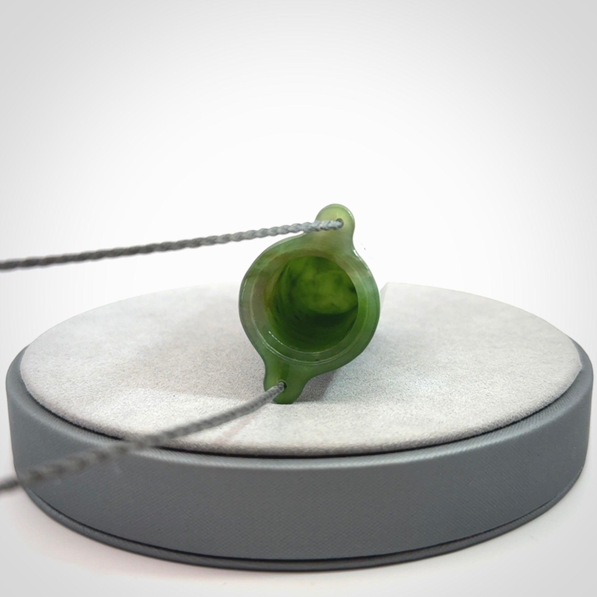 Hand carved British Columbian Jade container pendant