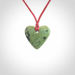 Hand carved small jade heart pendant