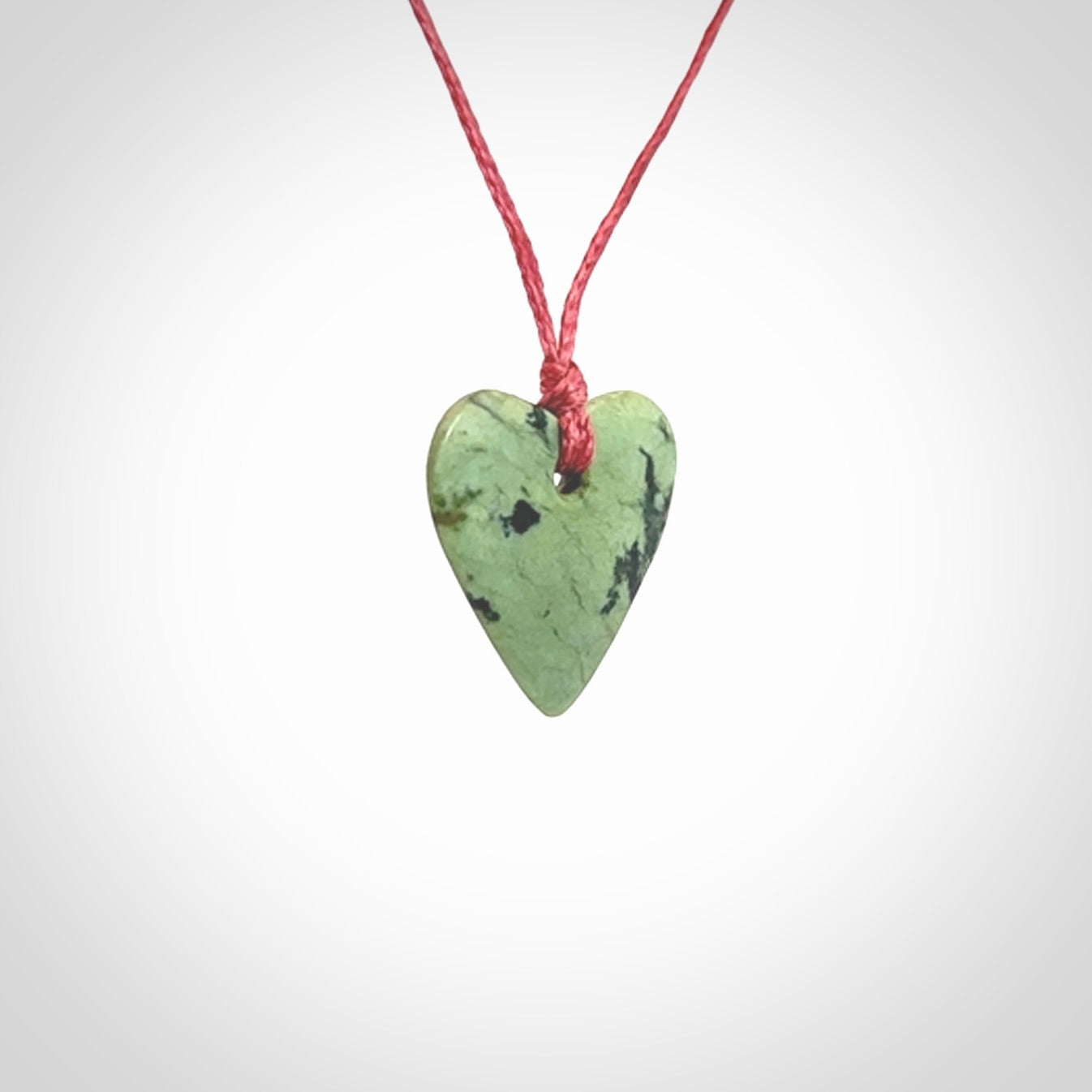 Hand carved small jade heart pendant