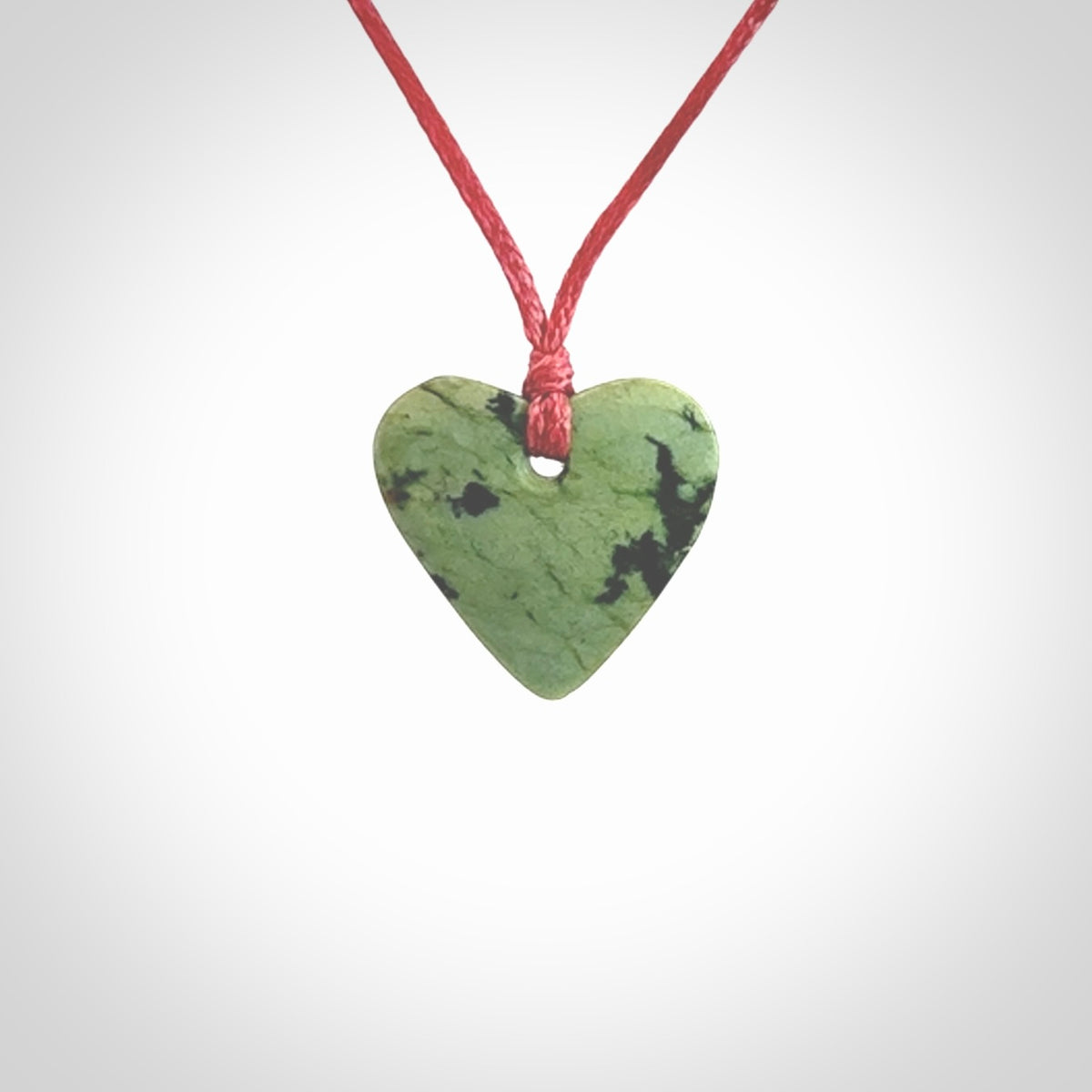 Hand carved small jade heart pendant