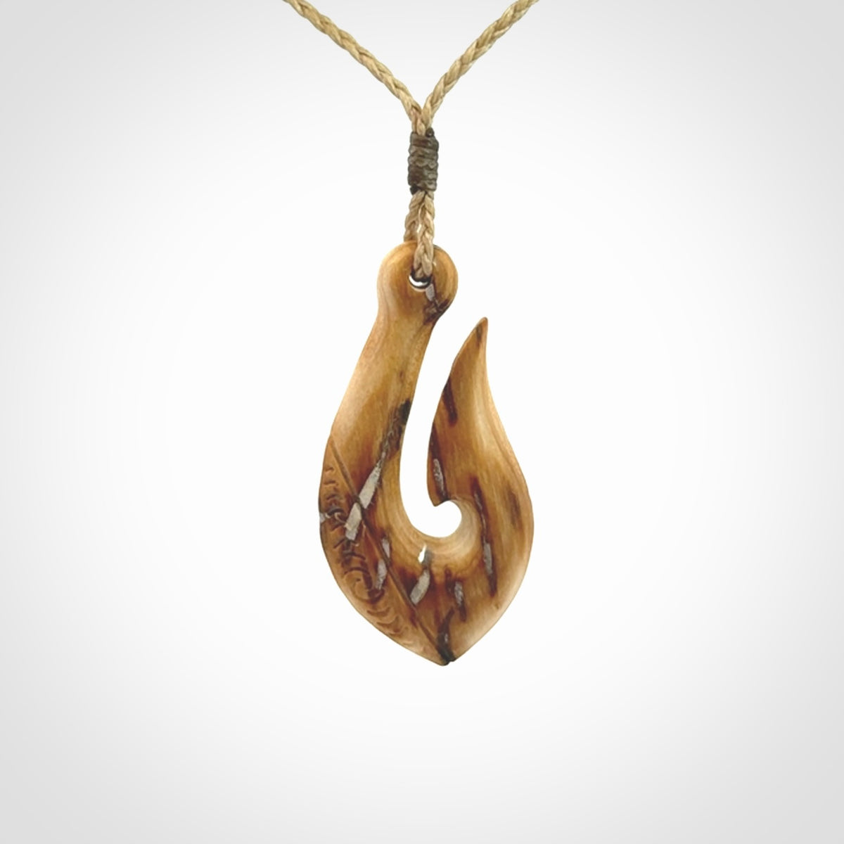 Hand Carved hook pendants in Beautiful Ancient Woolly Mammoth Tusk
