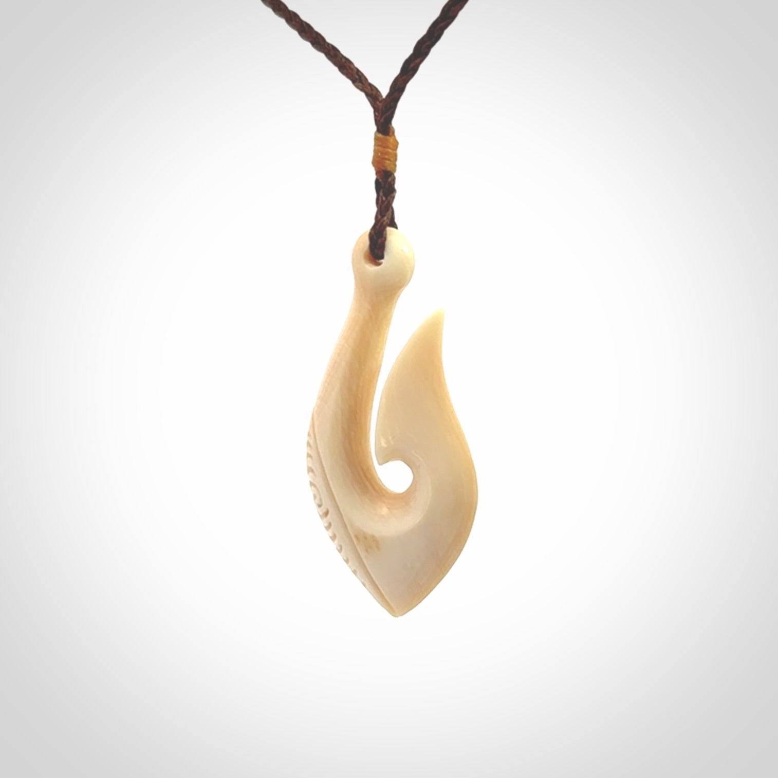 Hand Carved hook pendants in Beautiful Ancient Woolly Mammoth Tusk