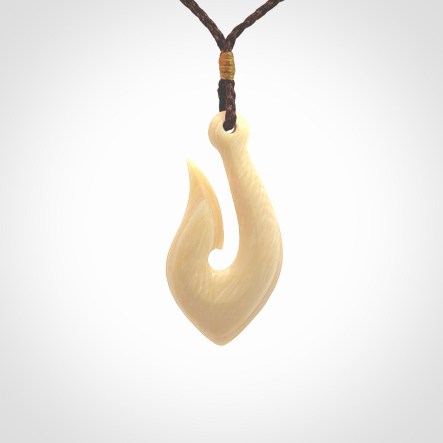 Hand Carved hook pendants in Beautiful Ancient Woolly Mammoth Tusk