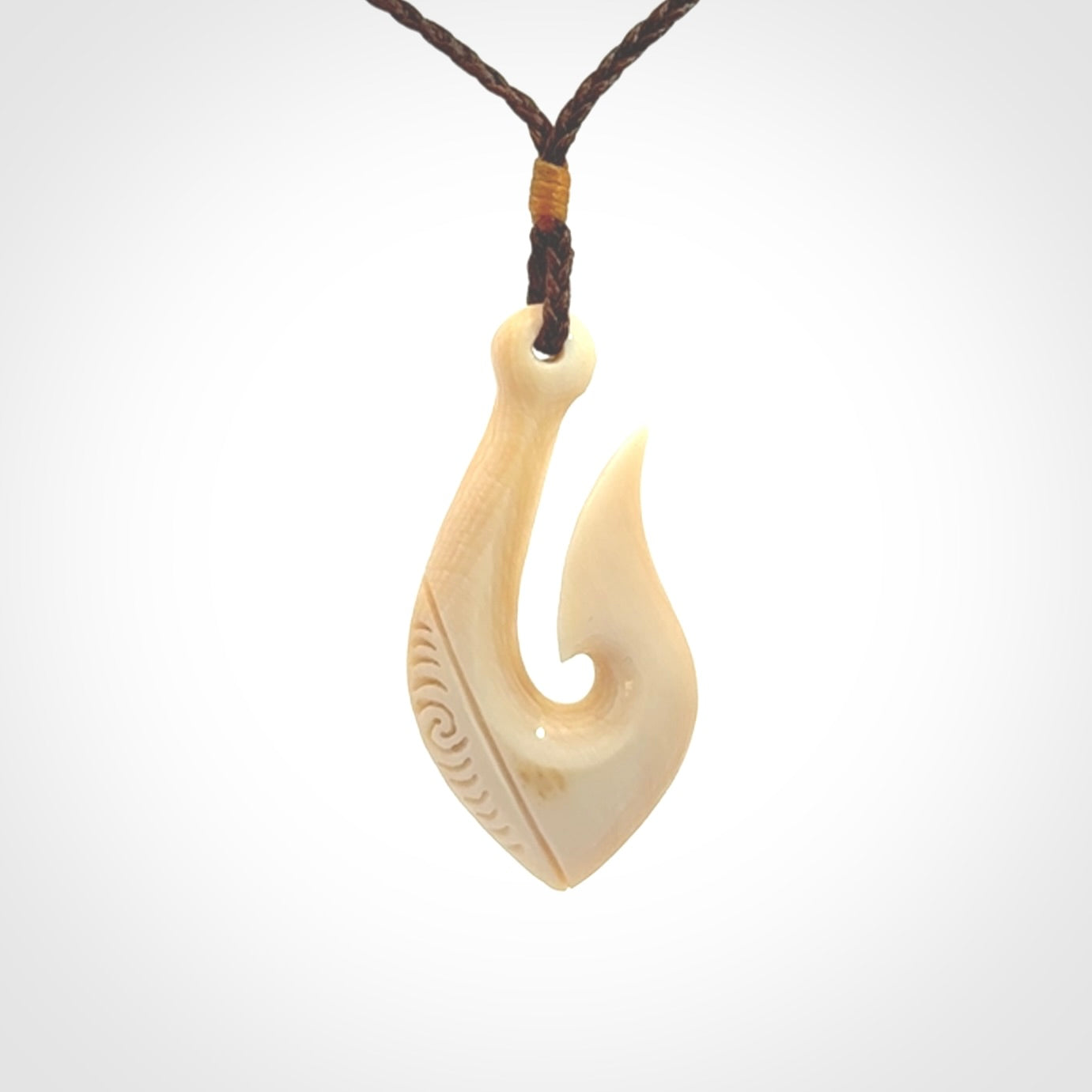 Hand Carved hook pendants in Beautiful Ancient Woolly Mammoth Tusk