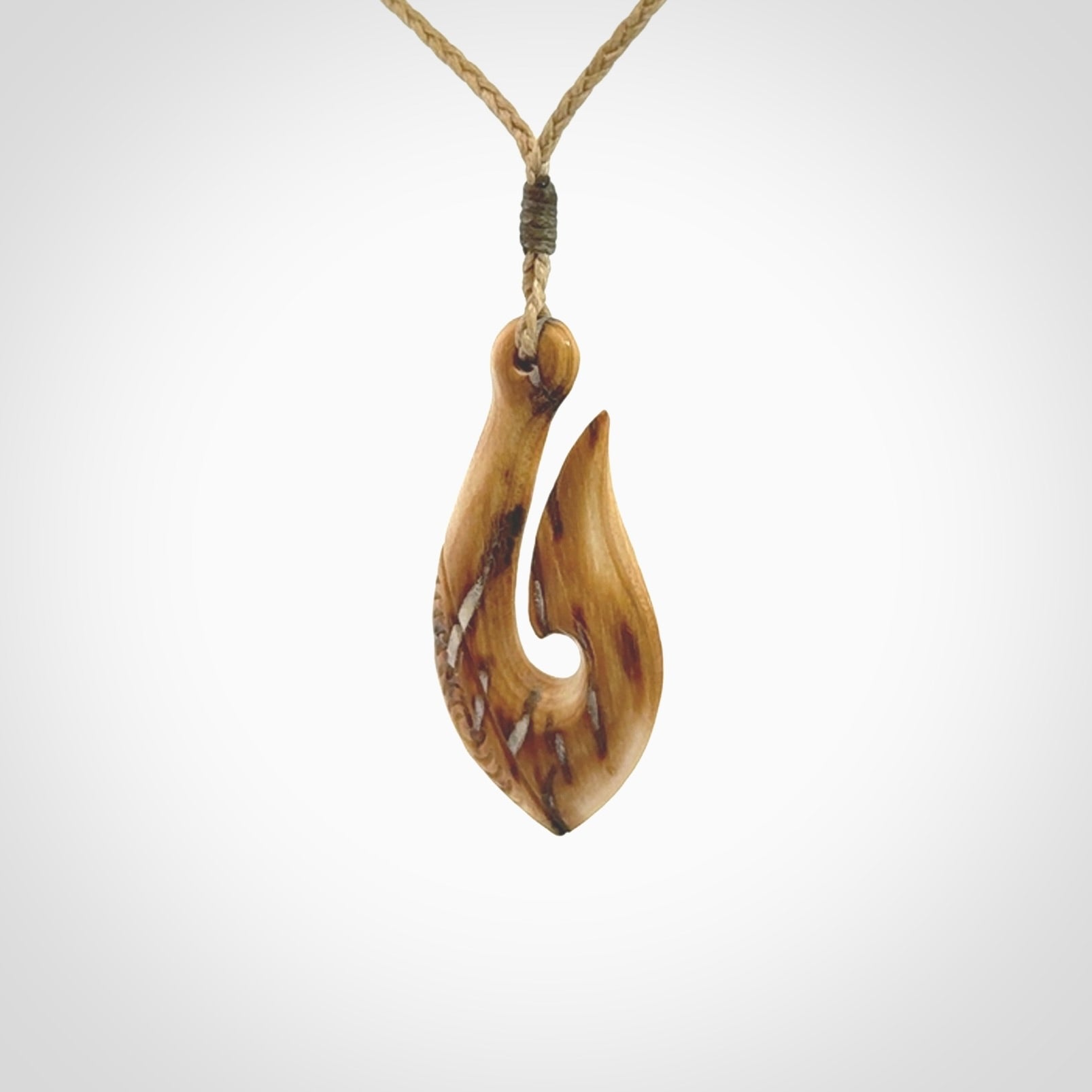 Hand Carved hook pendants in Beautiful Ancient Woolly Mammoth Tusk