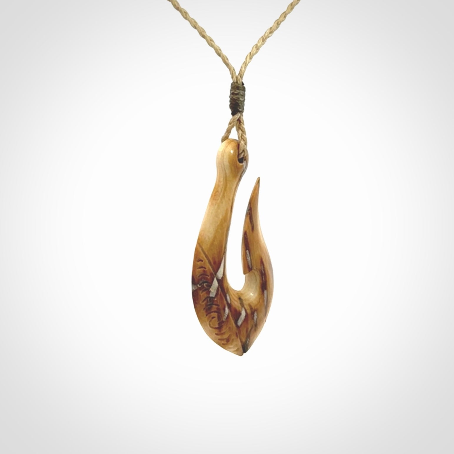 Hand Carved hook pendants in Beautiful Ancient Woolly Mammoth Tusk