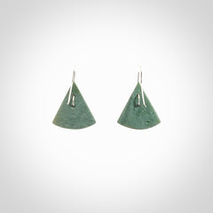 These modern jade drop earrings are beautifully hand made with gorgeous flair and chic design. They are fashionable and perfect for a women with style. Hand carved from a gorgeous piece of New Zealand Inanga jade with sterling silver hooks - they are elegant and beautiful.
