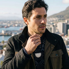 Man wearing bone pendant
