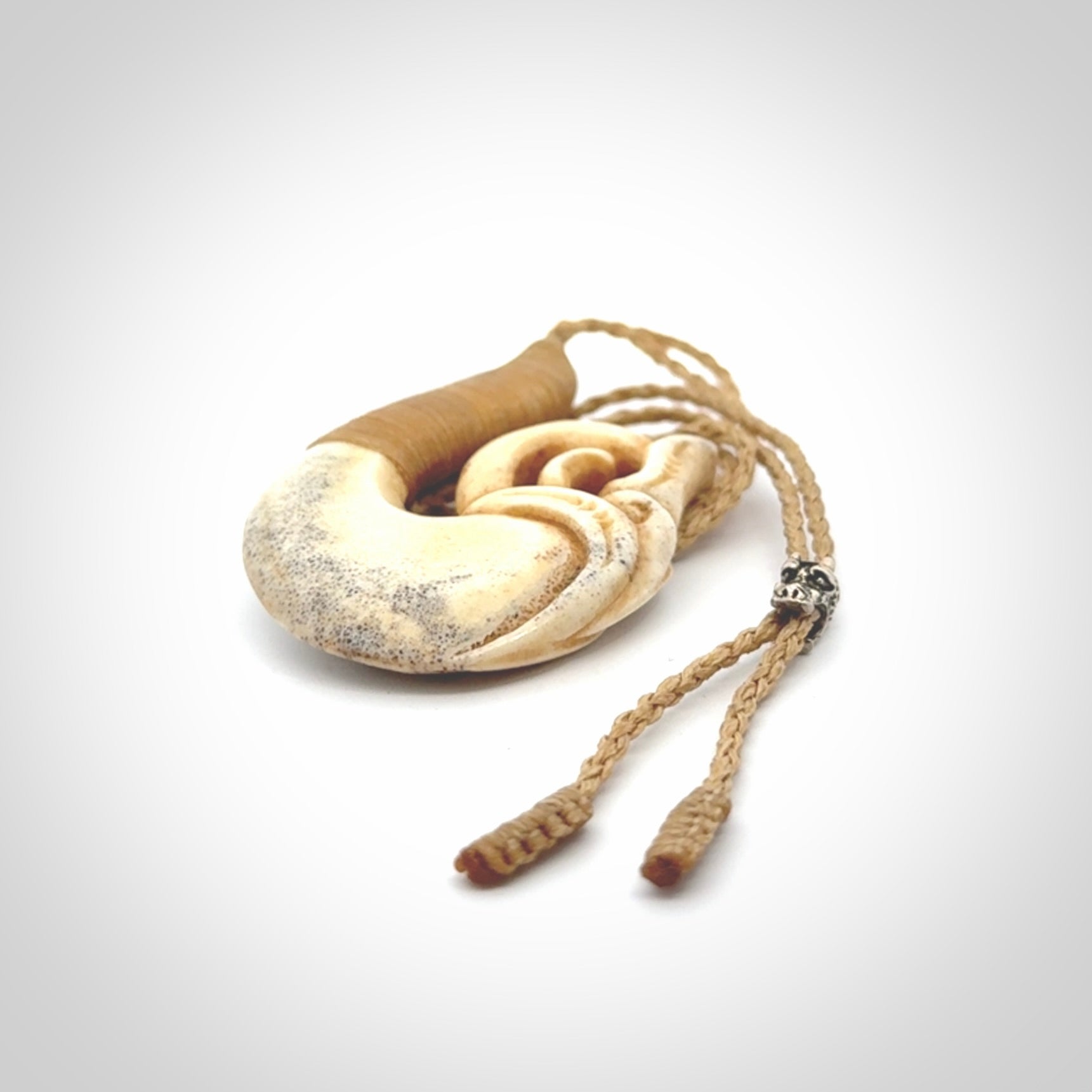 This is a wonderful pendant carved from Deer Antler. Hand made by Anthony Bray-Heta. Order yours now on NZ Pacific at www.nzpacific.com