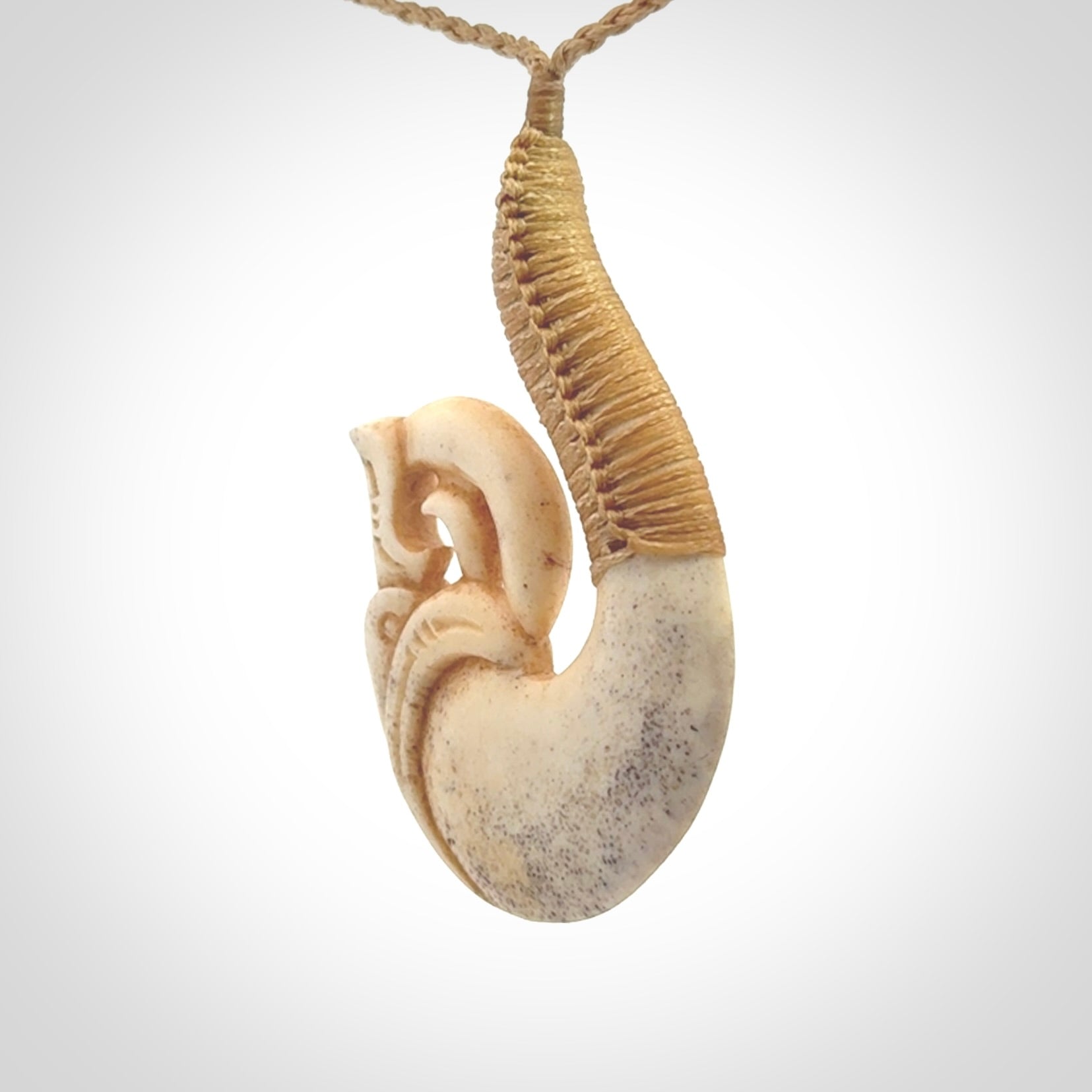 This is a wonderful pendant carved from Deer Antler. Hand made by Anthony Bray-Heta. Order yours now on NZ Pacific at www.nzpacific.com