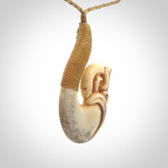 This is a wonderful pendant carved from Deer Antler. Hand made by Anthony Bray-Heta. Order yours now on NZ Pacific at www.nzpacific.com